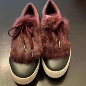 - Black leather and burgundy fur embellished sneakers